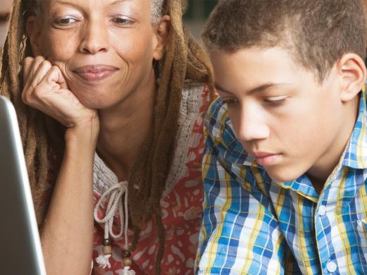Woman and boy at computer